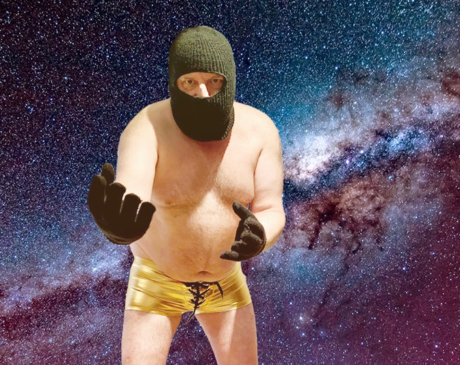 Shez in balaclava and gold hotpants, looking cosmic